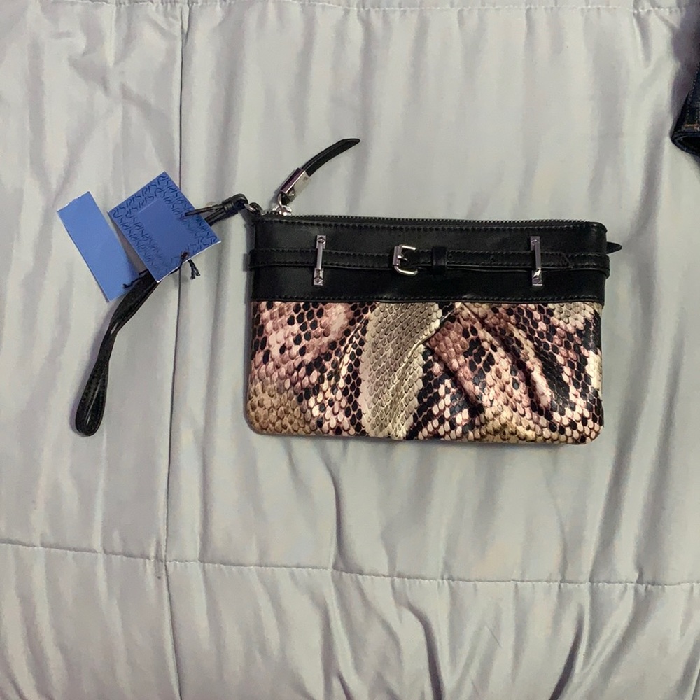 Snakeskin leather wristlet. Simply Vera wang